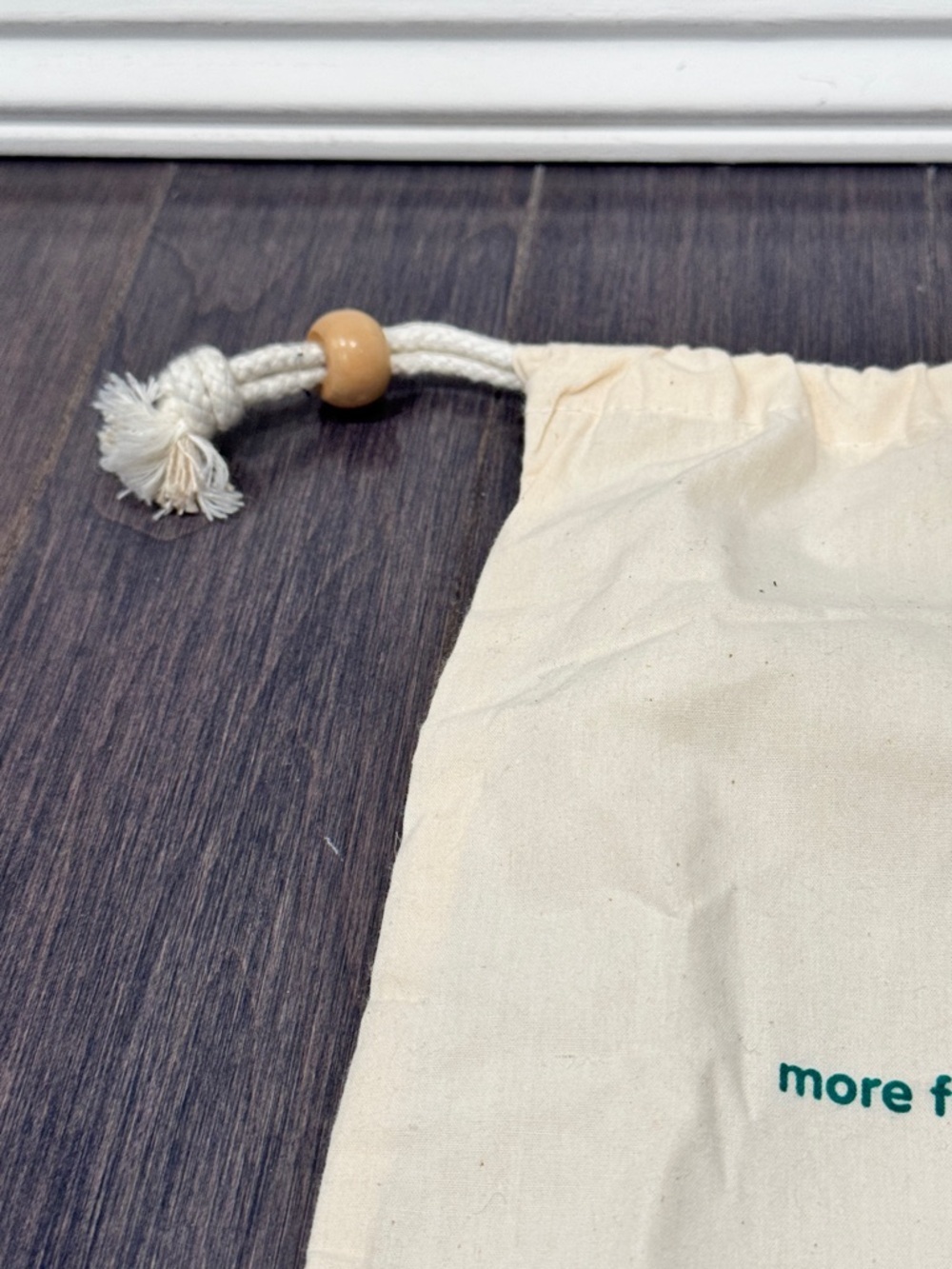 NWOT Baby 10” x 7” Canvas Drawstring Bag in Natural with Green Logo - Picture 3 of 6